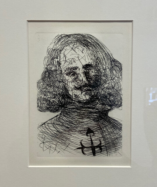 Framed Etching of Velazquez by Salvador Dali hanging in the Zilman Art Museum