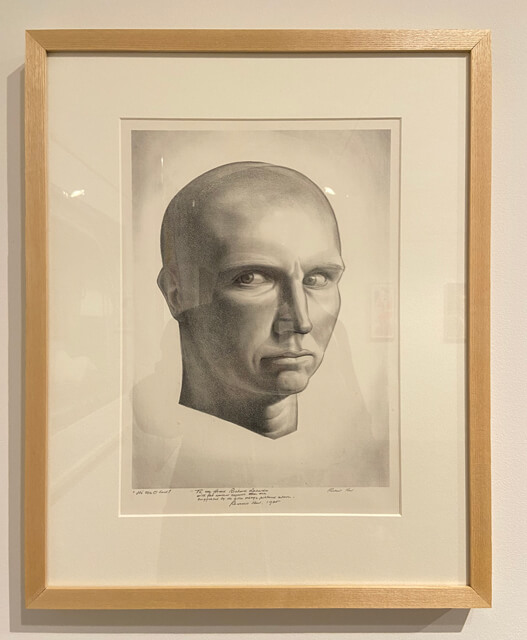 Framed lithograph portrait by Rockwell Kent hanging in the Zillman Art Museum